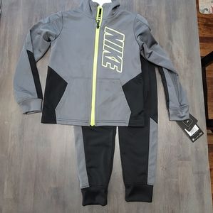 Nike track suit size 5